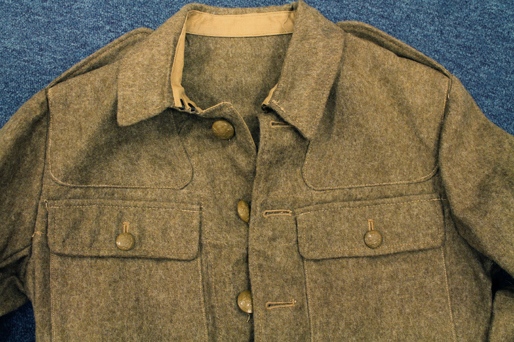 KHAKI 4-POCKET TUNIC 1946 DATE